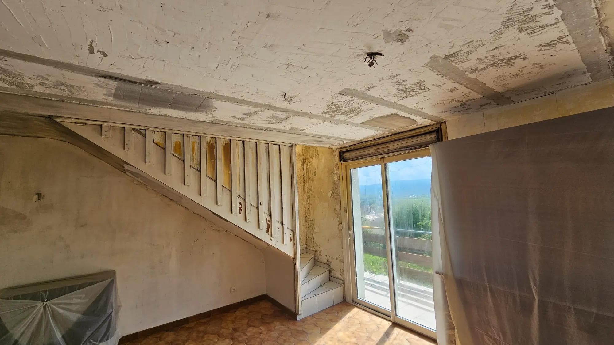 Réhabilitation et surélévation d’une maison individuelle sinistrée, Thise (25) galerie 6